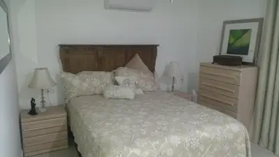 Cama o camas de una habitación en Apartmento con alberca a 50 mt del mar La Licha