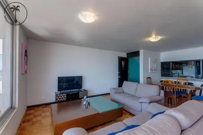 Una televisión o centro de entretenimiento en 2 BDR Apartment with Ocean View in Avenida del Mar