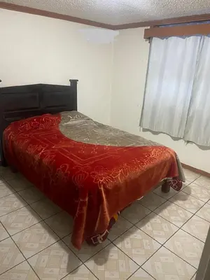 Cama o camas de una habitación en Hotel Doña Crucita
