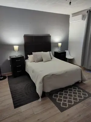 Cama o camas de una habitación en Casa Ragma