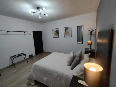 Cama o camas de una habitación en Casa Ragma