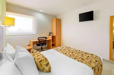 Cama o camas de una habitación en Sleep Inn Culiacan