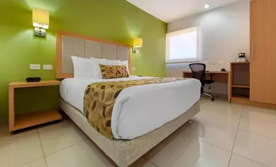 Cama o camas de una habitación en Sleep Inn Culiacan