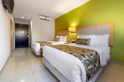 Cama o camas de una habitación en Sleep Inn Culiacan
