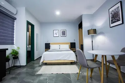 Cama o camas de una habitación en Nidah Condominios