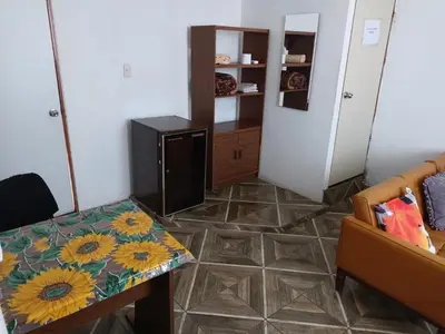 Zona de estar de Los Arcos Terraza Suites - Consulado General de los Estados Unidos USA a cinco minutos