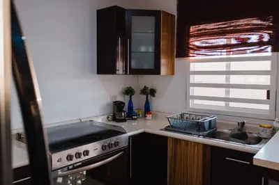 Una cocina o zona de cocina en Casa LU~NA hermoso alojamiento en privada