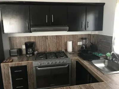 Una cocina o zona de cocina en Departamento a solo unos pasos de playa algodones