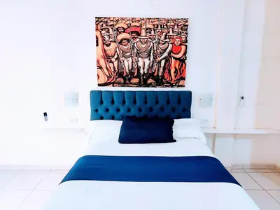 Cama o camas de una habitación en Apartamento 12 con dos camas , a 200 mts del vado del rio , cerca del centro de gobierno , internet de alta velocidad