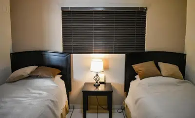 Cama o camas de una habitación en Tiara Sands 302