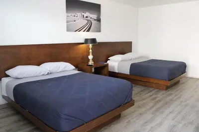 Cama o camas de una habitación en HOTEL MARIPINA