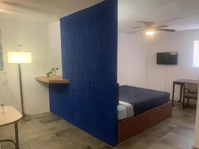 Cama o camas de una habitación en HOTEL MARIPINA