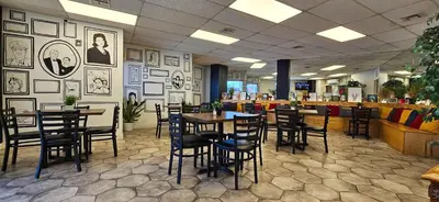 Un restaurante o sitio para comer en HOTEL MARIPINA