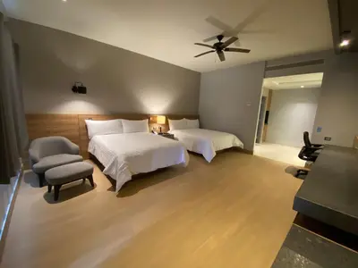 Cama o camas de una habitación en RIVI GRAND HOTEL
