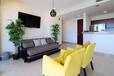 Una televisión o centro de entretenimiento en Departamento en renta en Gavias Grand Luxury