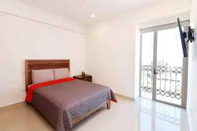 Cama o camas de una habitación en Departamento en renta en Gavias Grand Luxury