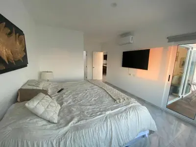 Cama o camas de una habitación en Lovely 2 bedroom oceanfront condo in Mazatlan