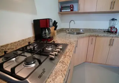 Una cocina o zona de cocina en Departamento en Sabalo cerca del mar en Mazatlan