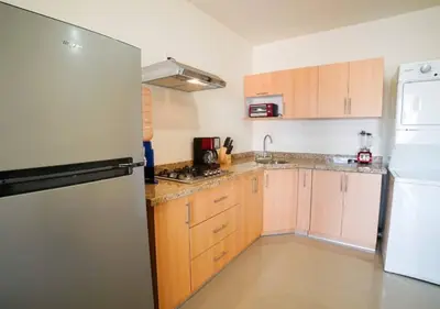 Una cocina o zona de cocina en Departamento en Sabalo cerca del mar en Mazatlan