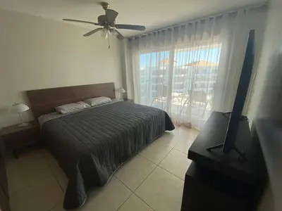 Cama o camas de una habitación en Departamento en Costa Veleros, vista a la Marina