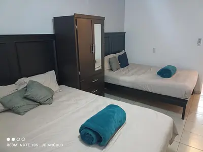 Cama o camas de una habitación en Depa sencillo, 10 min malecon