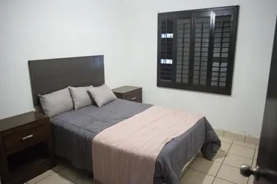 Cama o camas de una habitación en Casa Genova, casa amplia y comoda, terraza privada
