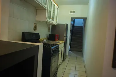 Una cocina o zona de cocina en Casa Genova, casa amplia y comoda, terraza privada