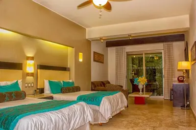 Cama o camas de una habitación en Zafiro Beach Boutique Resort