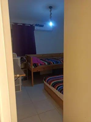 Cama o camas de una habitación en Airport Hostel