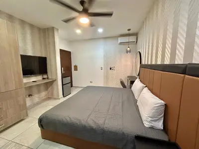 Cama o camas de una habitación en Habitación hotelera 5min de la playa by G P S rentas