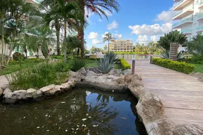 Jardín al aire libre en Habitación hotelera 5min de la playa by G P S rentas