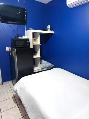 Una cocina o zona de cocina en Habitacion 11 independiente con mucha privacidad ,cerca del consulado , CAS , a 200 mts del vado del rio