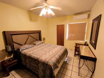 Cama o camas de una habitación en Casa Villa Serena 5, enfrente de la alberca!