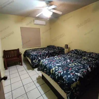 Cama o camas de una habitación en Casa Villa Serena 5, enfrente de la alberca!
