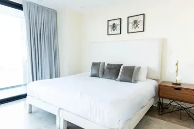 Cama o camas de una habitación en Hermosa terraza! Playa a 2 minutos!