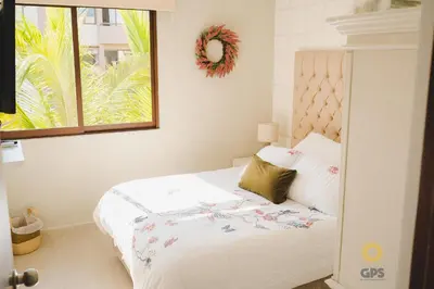 Cama o camas de una habitación en Con alberca a 5 minutos de la playa by G P S rentas