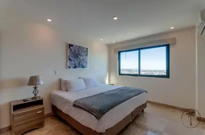 Cama o camas de una habitación en Dpto 2 hab Vista al Mar & Amenidades