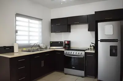 Una cocina o zona de cocina en ALBERCA 3 HABITACIONES, CERCA DE LA PLAYA, Cantera Residencial
