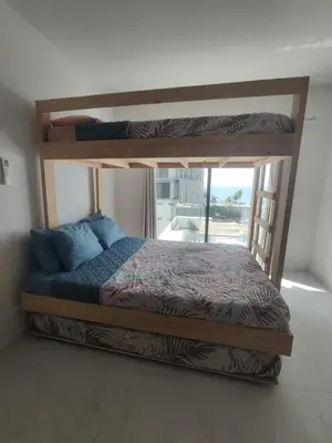 Cama o camas de una habitación en Pent-house a media cuadra del malecón, Hookipa Tower!
