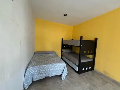 Cama o camas de una habitación en Departamento con palapa, 2 cuartos