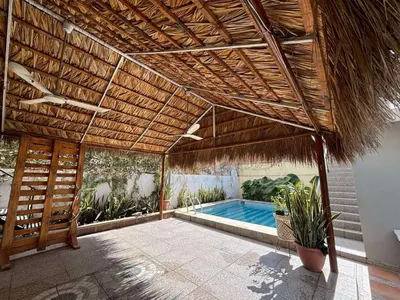 Piscina en o cerca de Departamento con palapa, 2 cuartos