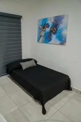 Cama o camas de una habitación en Planta Baja, a 10 minutos de la playa, Gran alberca y Mini Golf!!