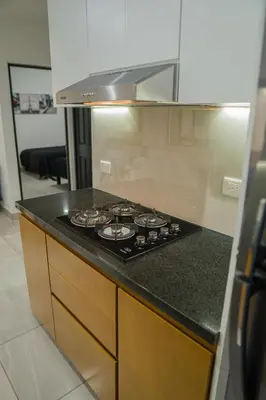 Una cocina o zona de cocina en Planta Baja, a 10 minutos de la playa, Gran alberca y Mini Golf!!