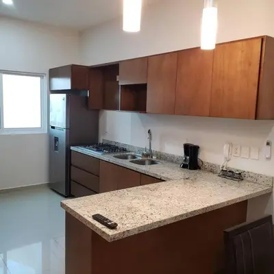 Una cocina o zona de cocina en Condo Monaco en Sabalo Country