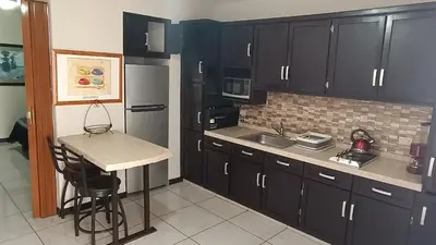 Una cocina o zona de cocina en Suites Entrelagos