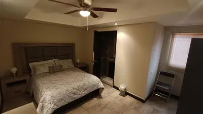 Cama o camas de una habitación en Suites Entrelagos