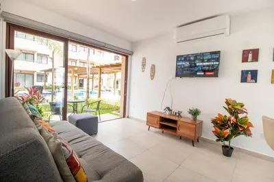 Una televisión o centro de entretenimiento en Ambar Condominios Mazatlan