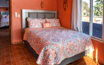 Cama o camas de una habitación en Casa Belen - Beautiful Beach View Home on Stone Island
