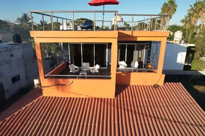 Un balcón o terraza de Casa Belen - Beautiful Beach View Home on Stone Island