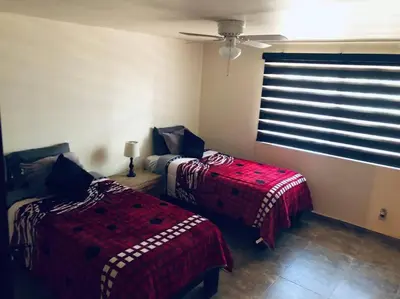 Cama o camas de una habitación en Amplia casa en Colonia Campestre